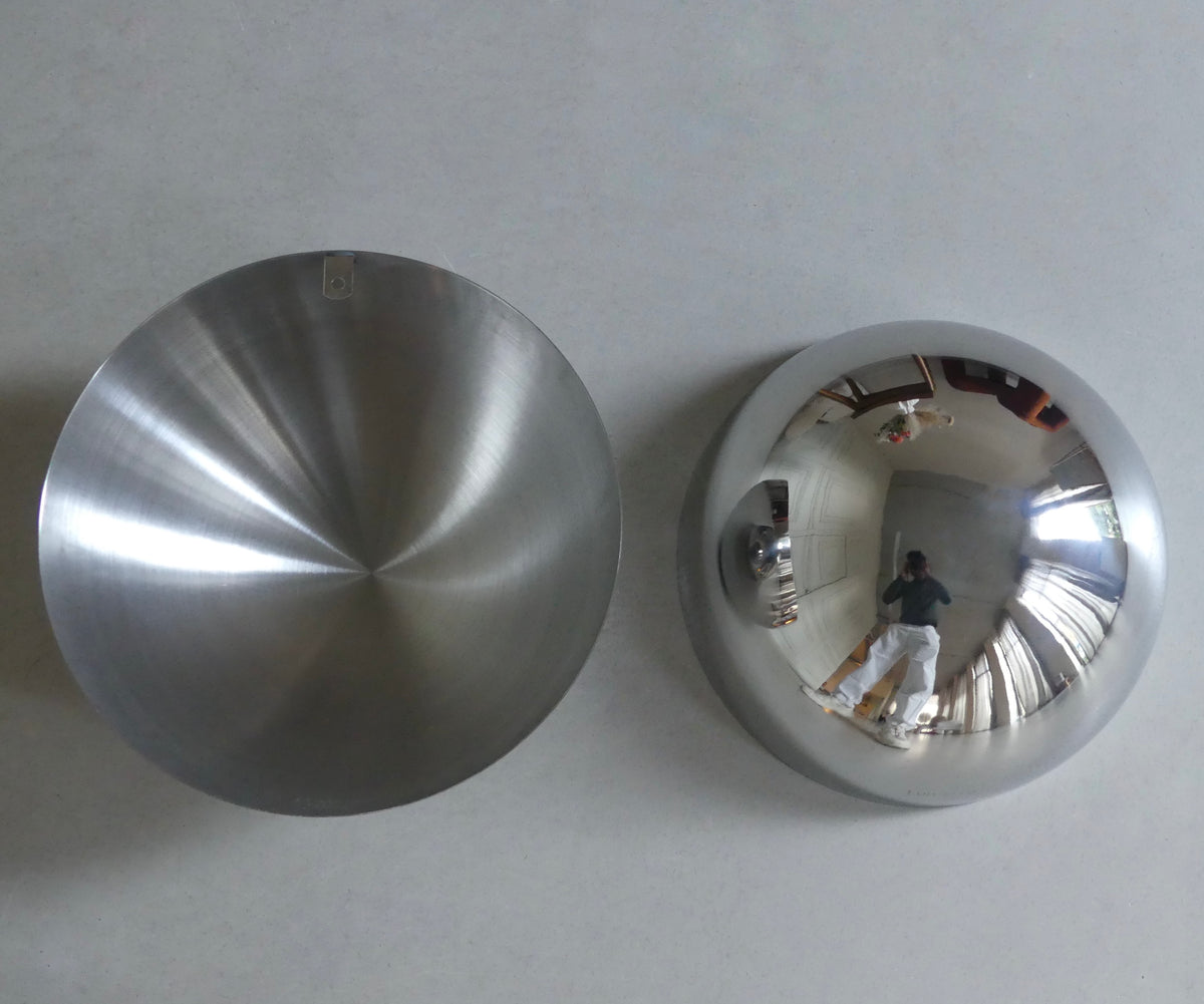 A close-up of the polished outside and brushed matte inside of the Lumevre convex mirror 35 cm