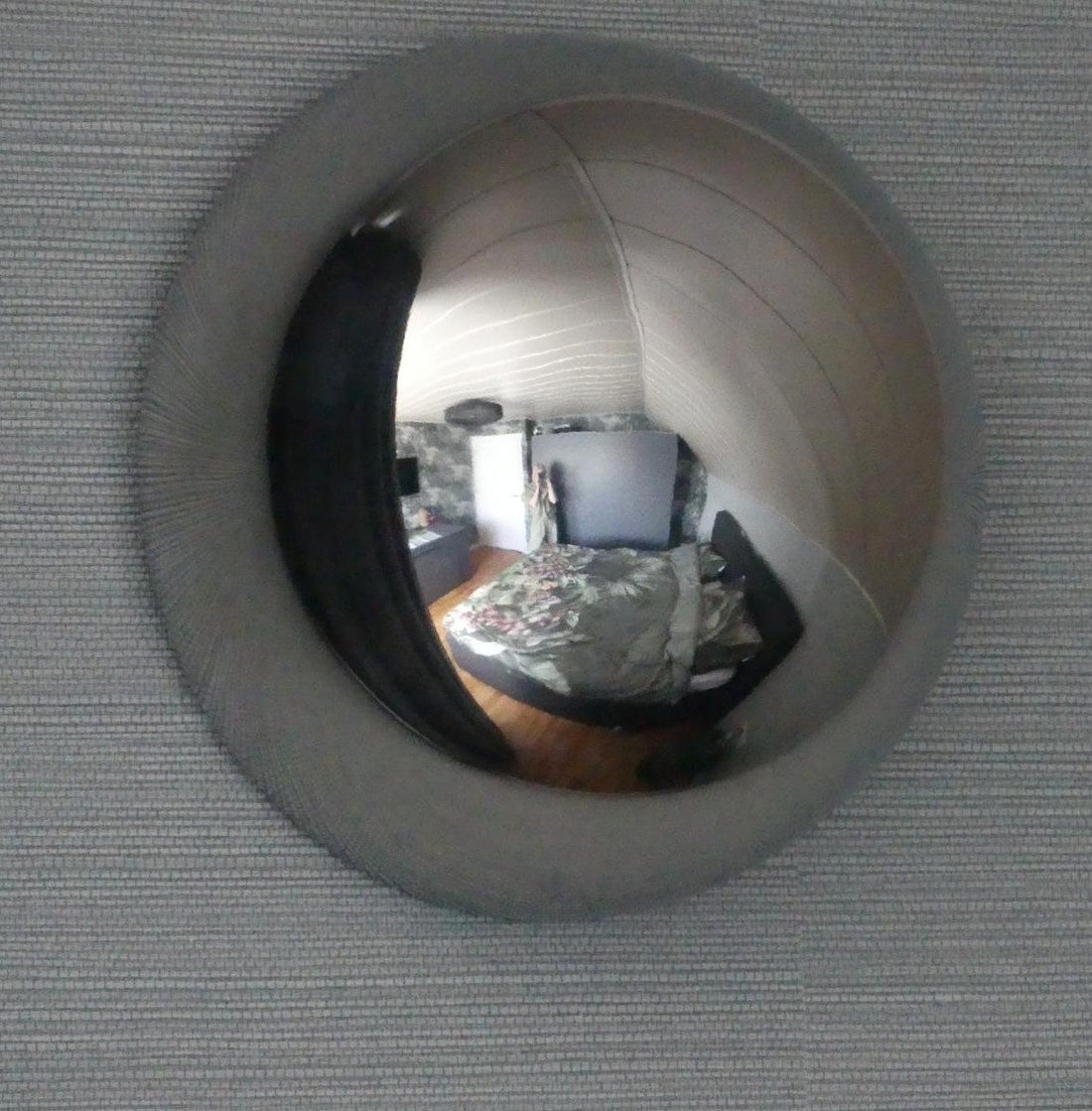 How one convex mirror completely changes the feeling in a room