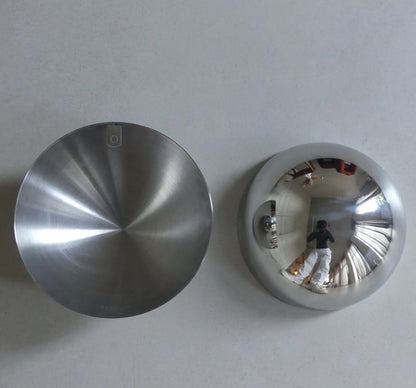 A close-up of the polished outside and brushed matte inside of the Lumevre convex mirror 25 cm