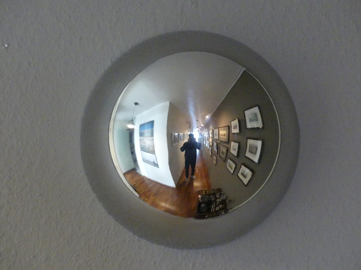 The effect of a Lumevre convex mirror in a hallway