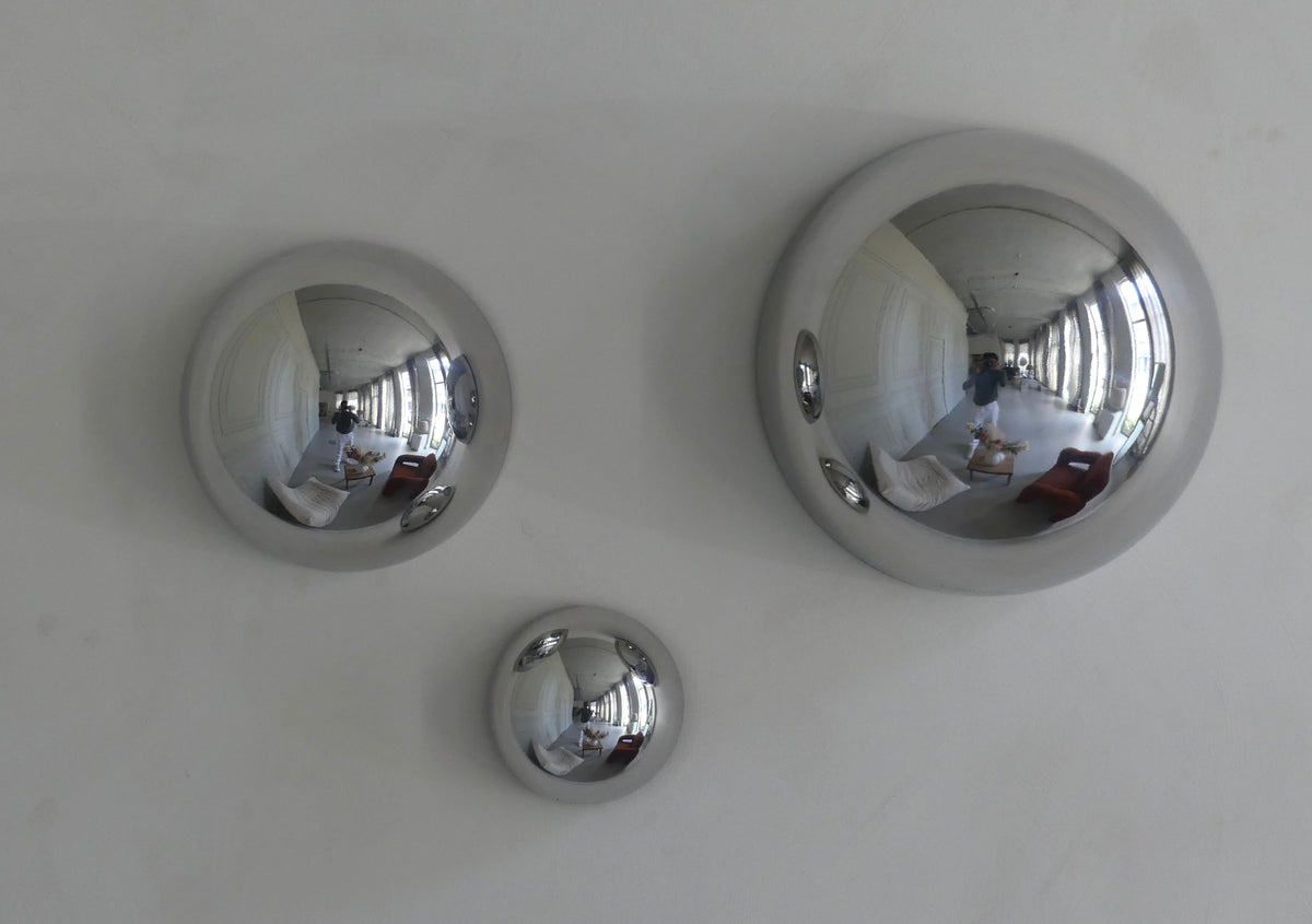 All three Lumevre convex mirrors side by side on one wall.